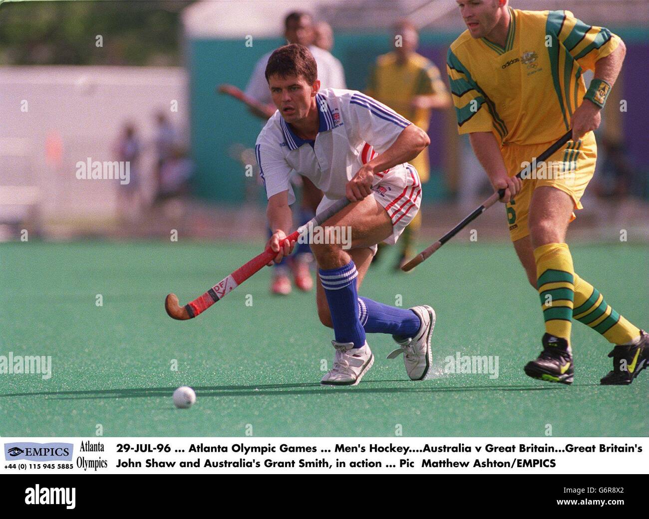 29-JUL-96 ... Atlanta Olympic Games ... Men's Hockey. Australia v Great  Britain. Great Britain's John Shaw and Australia's Grant Smith, in action  Stock Photo - Alamy