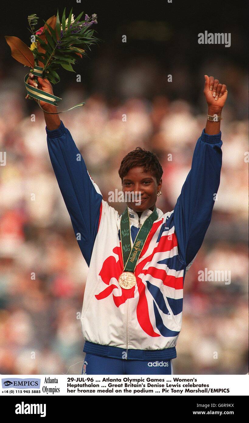 29-JUL-96 ... Atlanta Olympic Games ... Women's Heptathalon ... Great  Britain's Denise Lewis celebrates her bronze medal on the podium Stock  Photo - Alamy