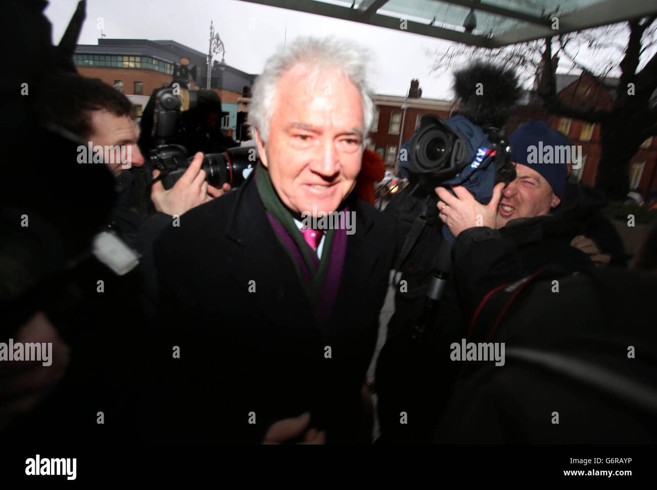 Sean Fitzpatrick, former chairman of Anglo Irish Bank, arrives at the
