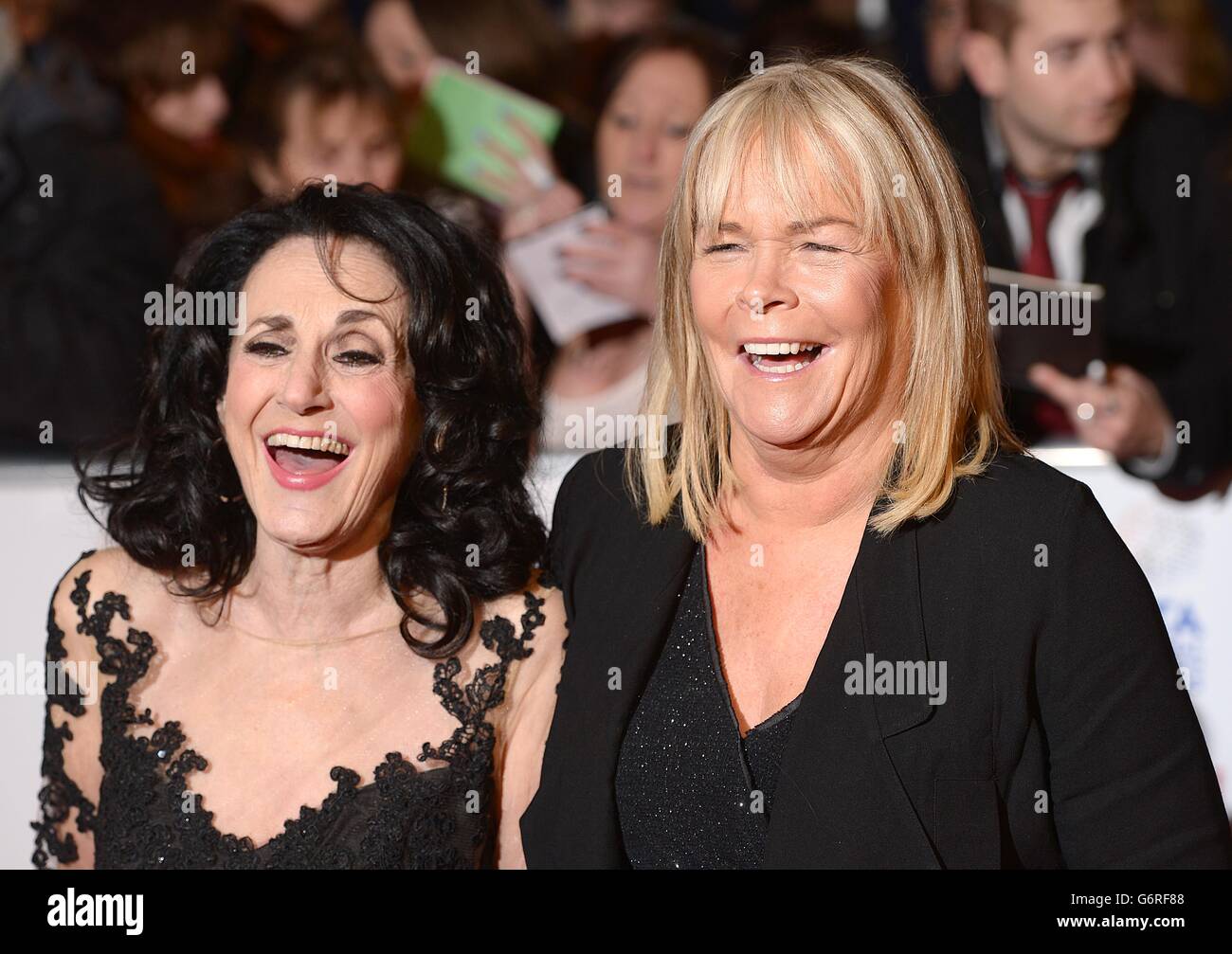 Leslie Joseph and Linda Robson arriving for the 2014 National Television Awards at the O2 Arena, London. Stock Photo