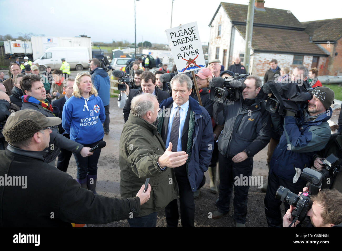 Environment Secretary Owen Paterson (centre) visiting Northmoor Pumping Station in Somerset. Stock Photo