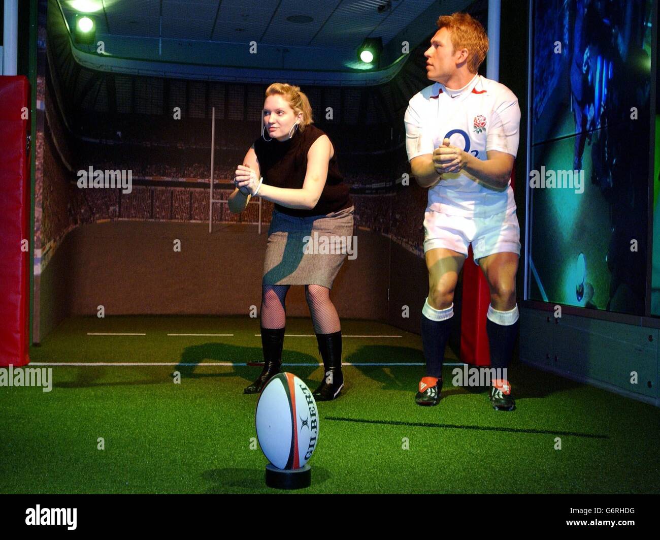 A waxwork of England Rugby hero Jonny Wilkinson is unveiled at Madame Tussaud's in central London. Alongside the new wax figure guests will be coached to learn how to emulate Wilkinson's unique preparation ritual before kicking for World Cup victory in a specially designed, Twickenham inspired set. Annelisa Hoadley from Silsoe in Bedfordshire trys her luck. Stock Photo