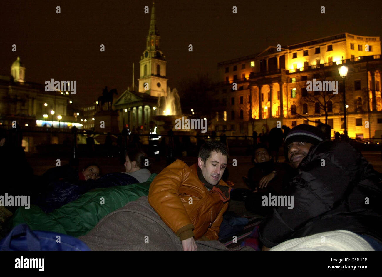 Campaigners join asylum seekers bedding down for the night in London's Trafalgar Square as part of a protest by the Campaign Against the Destitution of Asylum Seekers, demanding the repeal of Section 55 of the Immigration Act. Stock Photo