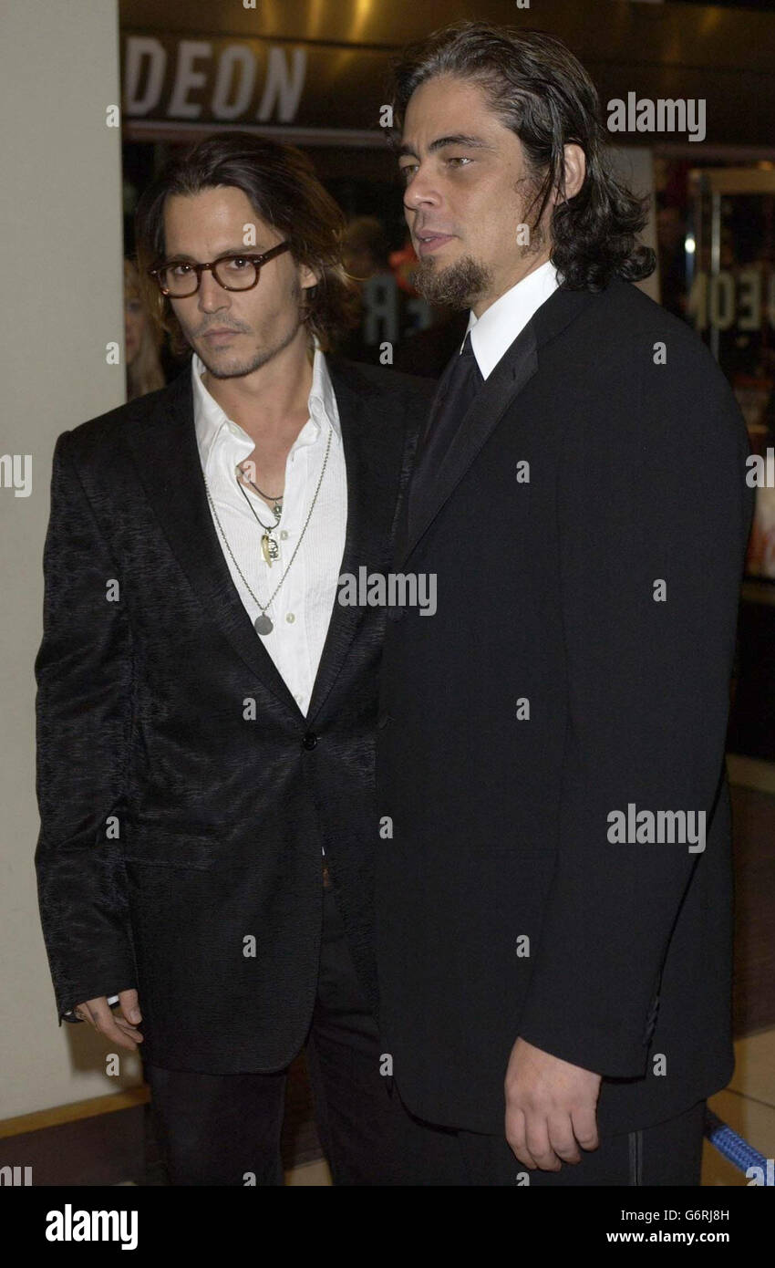 Actors Johnny Depp (left) and Benicio Del Toro arrives for the Orange British Academy Film Awards at the Odeon Leicester Square in London. Stock Photo
