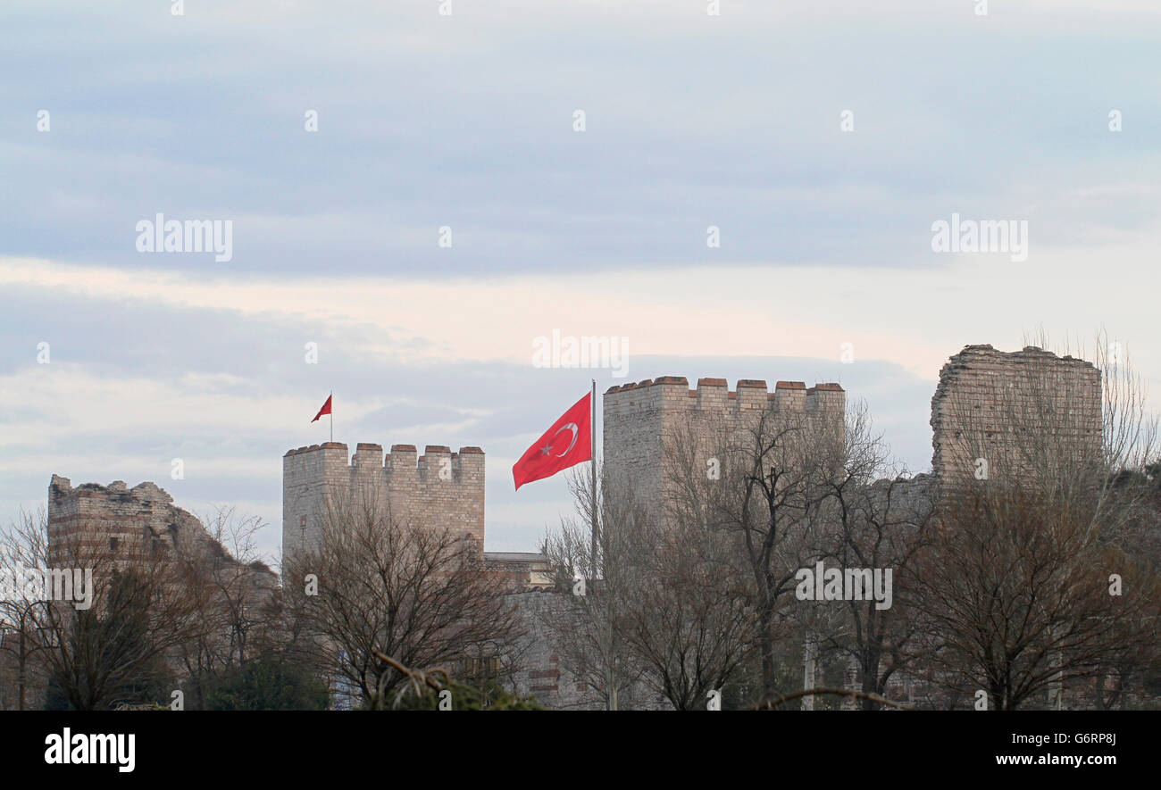 Flag of Turkey on the Theodosian city walls of Istanbul in Turkey. Stock Photo