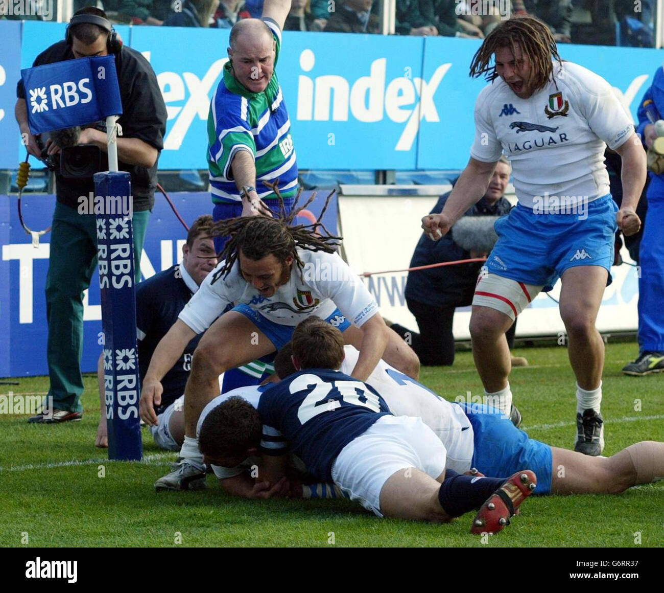 Italy's Paul Griffen (left) and Martin Castrogiovanni celebrate Italy's try against Scotland during the RBS 6 Nations match at the Stadio Flaminio, Rome, Saturday March 6, 2004. Stock Photo