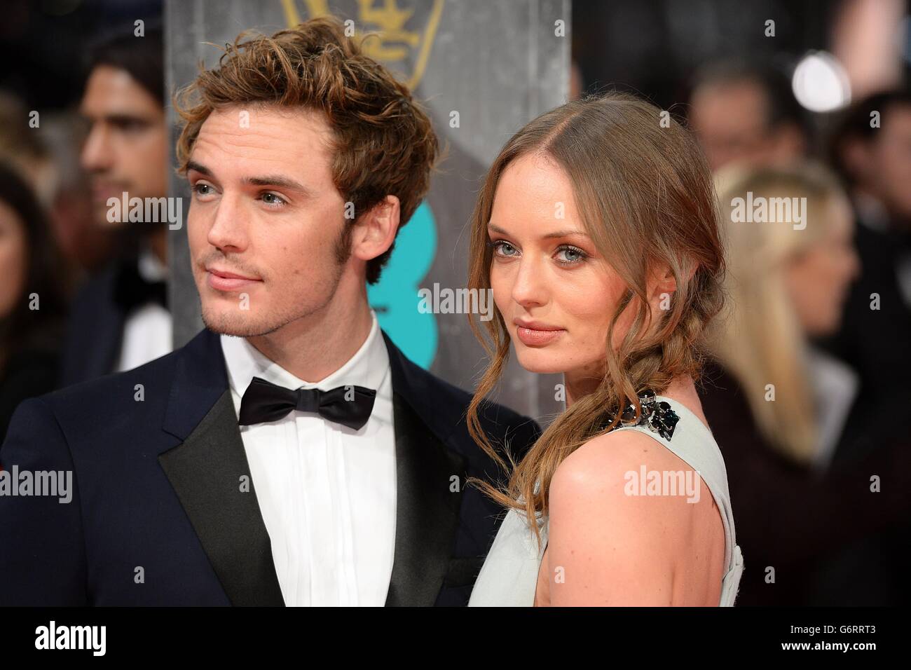 Sam Claflin and Laura Haddock arriving at The EE British Academy Film  Awards 2014, at the Royal Opera House, Bow Street, London Stock Photo -  Alamy, image size:1300x956