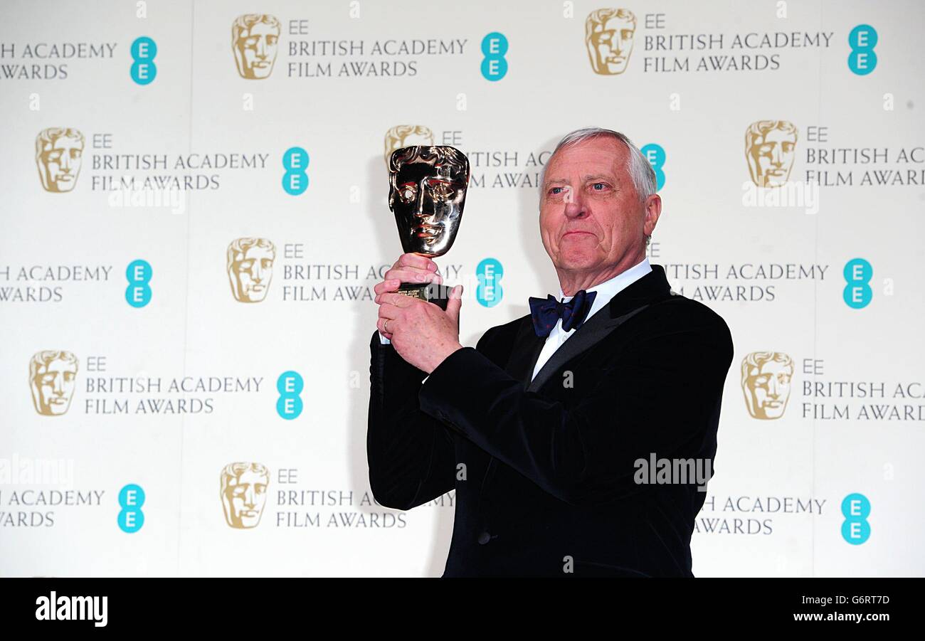 Peter Greenaway with the award for Outstanding Contribution to British Cinema, at The EE British Academy Film Awards 2014, at the Royal Opera House, Bow Street, London. Stock Photo