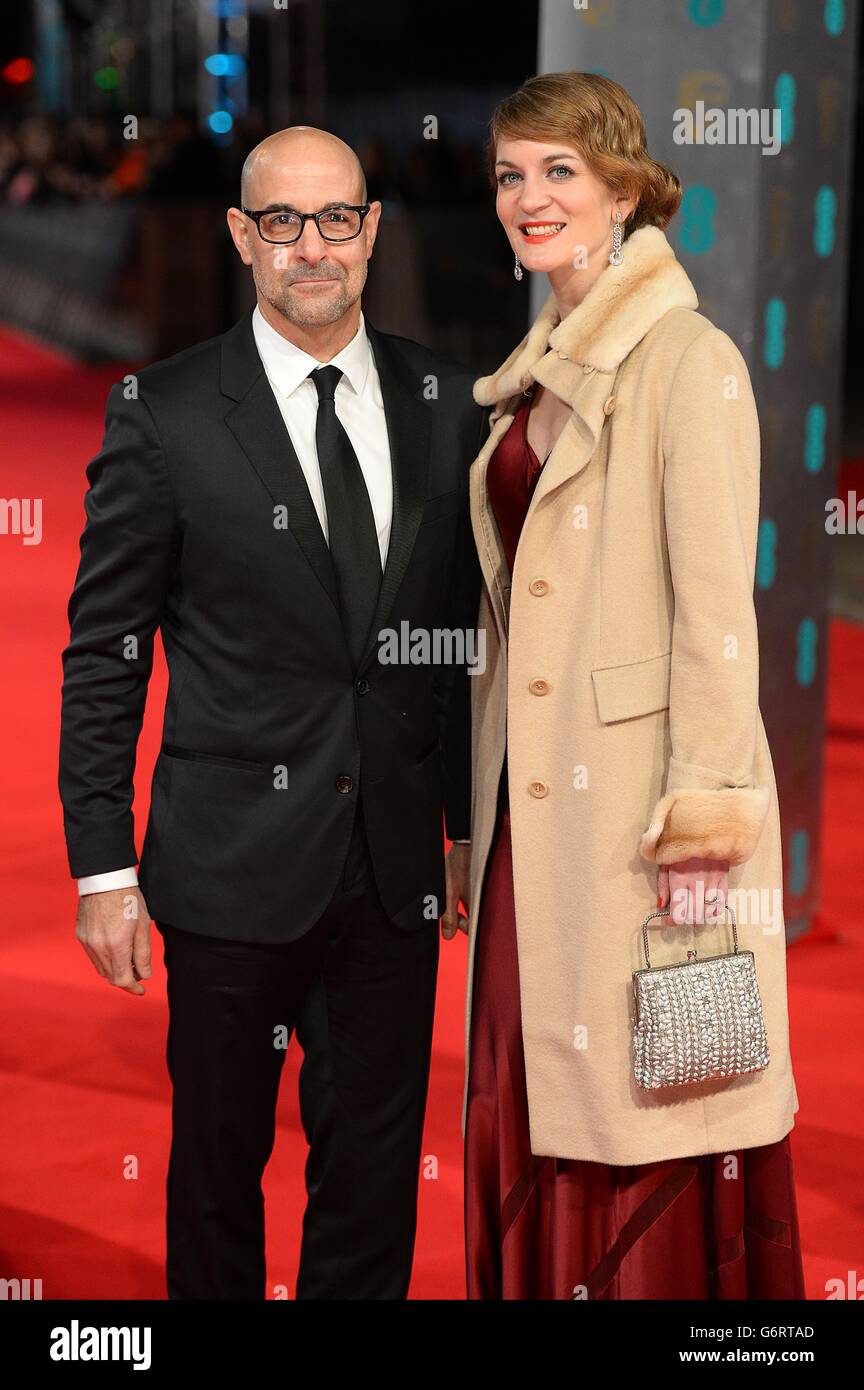 Stanley Tucci and Felicity Blunt arriving at The EE British Academy Film Awards 2014, at the Royal Opera House, Bow Street, London. Stock Photo