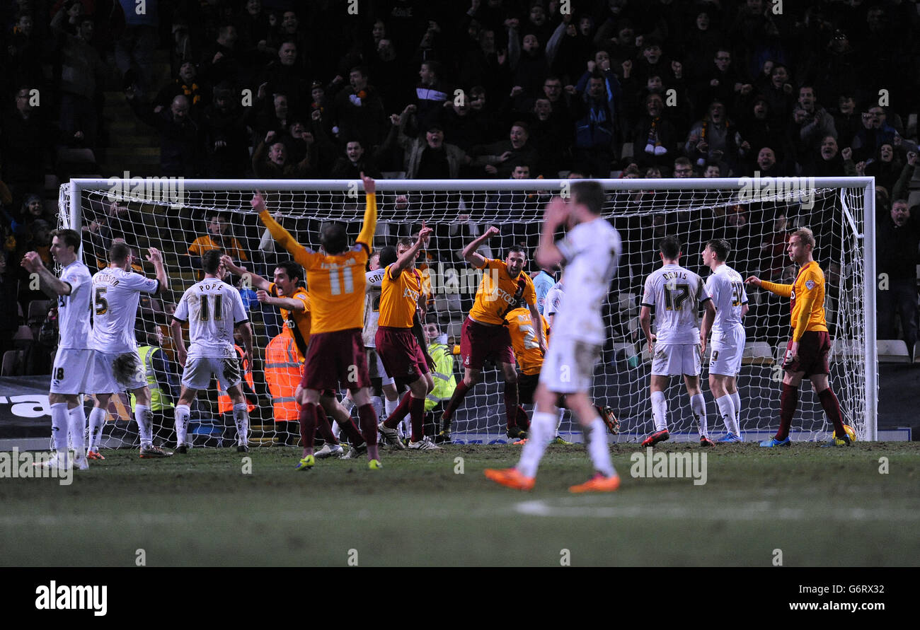 Bradford City players celebrate as Carl McHugh (fourth from the left) scores the only goal of