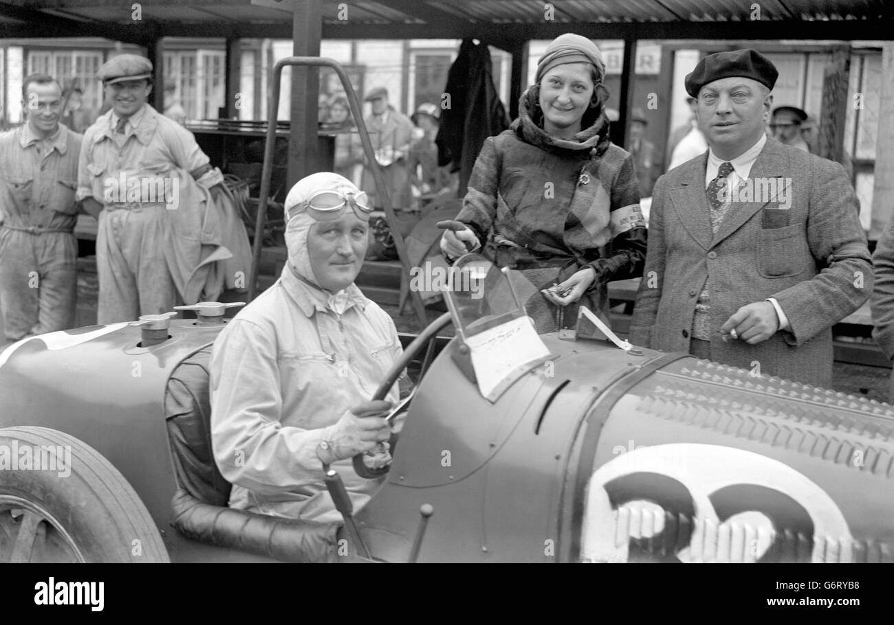 Count Stanislas Czakowski, before leaving the pits in his Bugatti at Brooklands. The Countess is also seen. Stock Photo