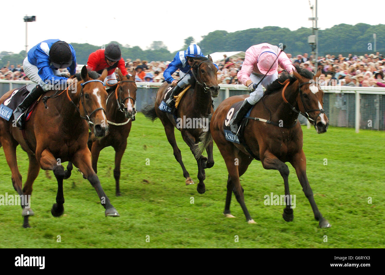Thakafaat and jockey Willie Supple (L) beat Twyla Tharp and Jimmy Fortune to win the Ribblesdale Stakes. Stock Photo