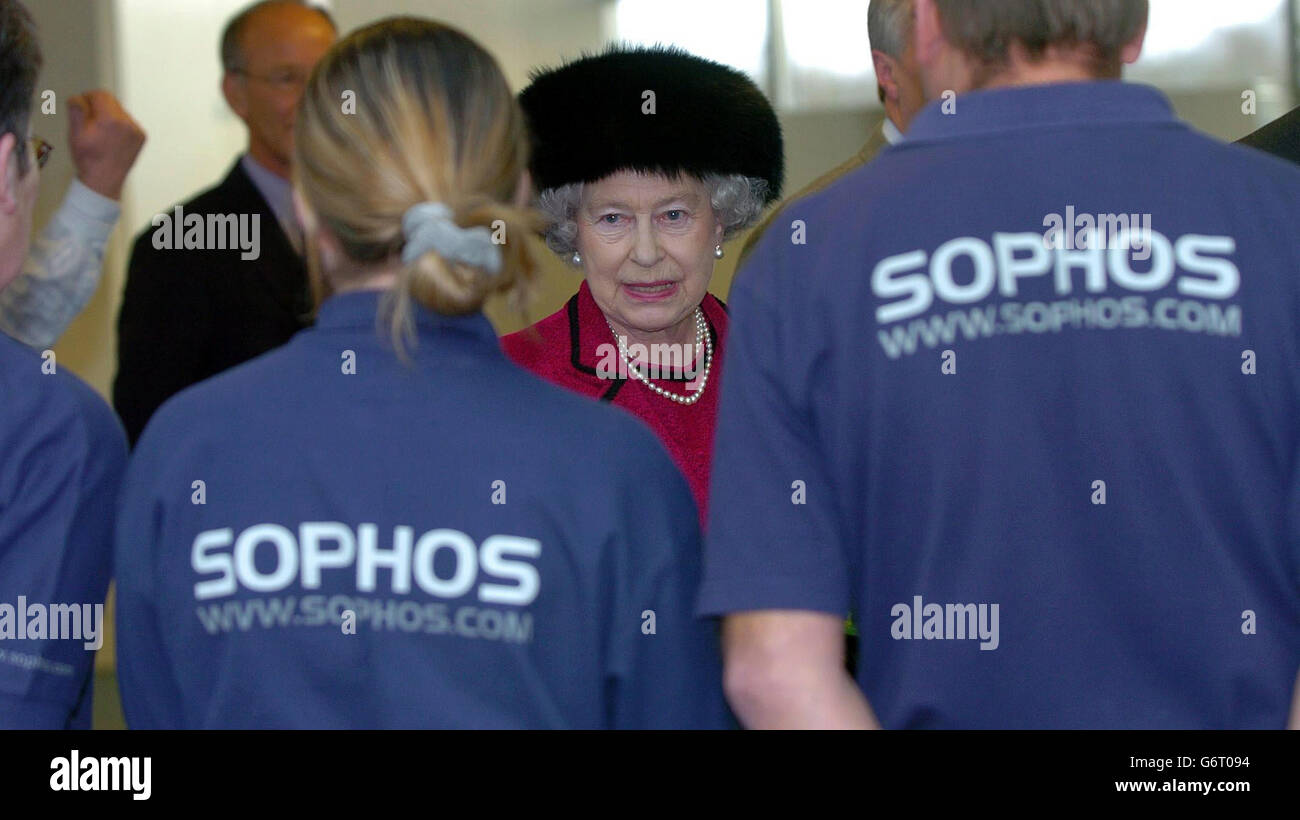Britain's Queen Elizabeth II meets employess of SOPHOS, a leading computer company specialising in anti-virus technology, during a visit to their headquarters in Abingdon Oxford. The Queen also went on a tour of a 'virus lab' at the award-winning company before opening a new atrium. Stock Photo