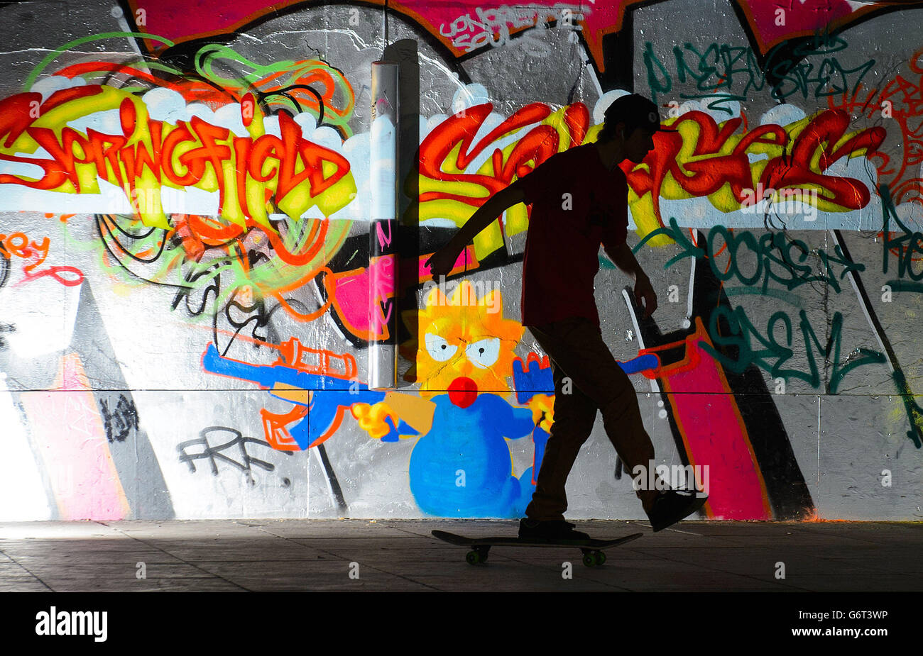 A skateboarder uses the skate park in the undercroft of the South Bank Centre, in central London. Stock Photo