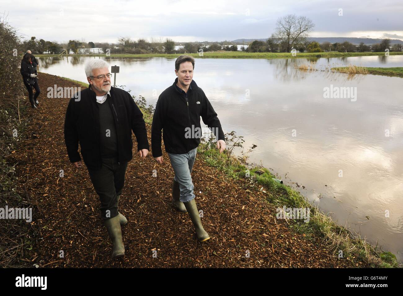 Deputy Prime Minister Nick Clegg is shown around flooding sites by Burrowbridge businessman John Davison as he visits the flood hit area of Burrowbridge, Somerset. Stock Photo