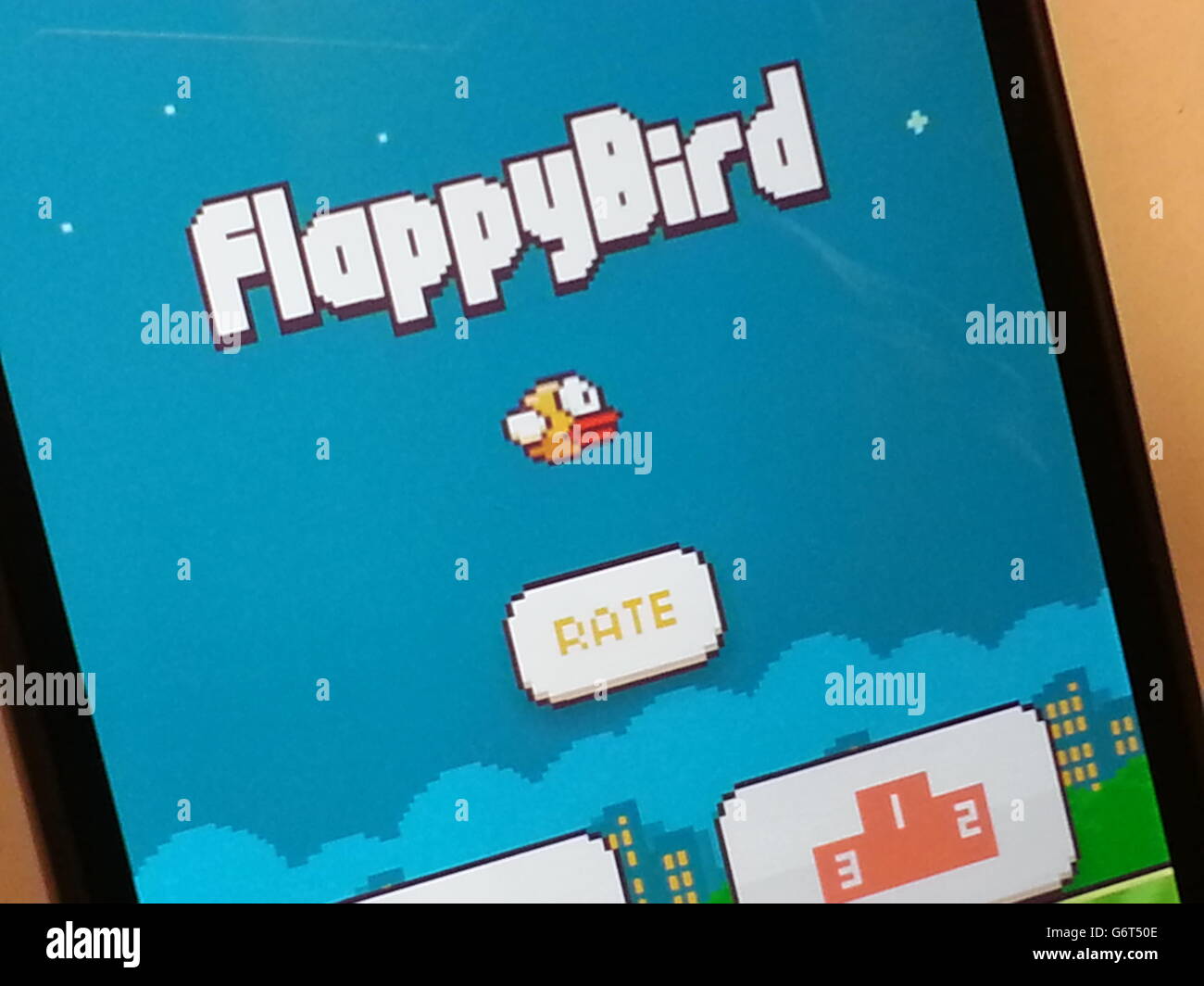 FlappyBird stock. A view of the FlappyBird game open on an iPhone. Stock Photo