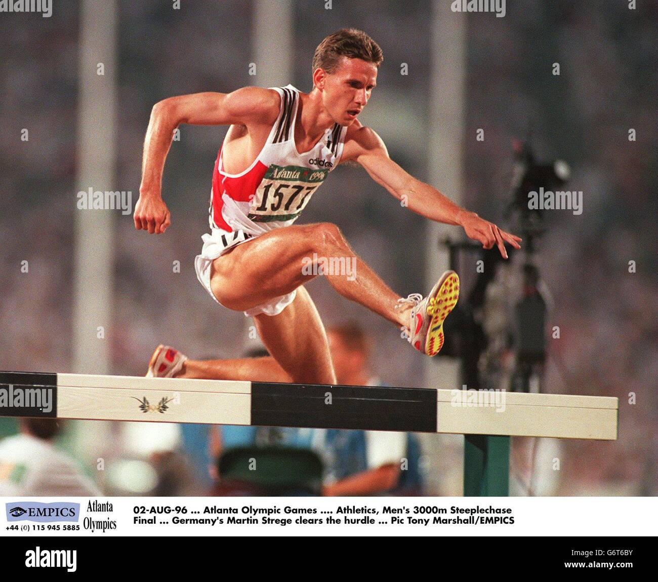 Mens 3000m steeplechase final germanys martin strege clears the hurdle