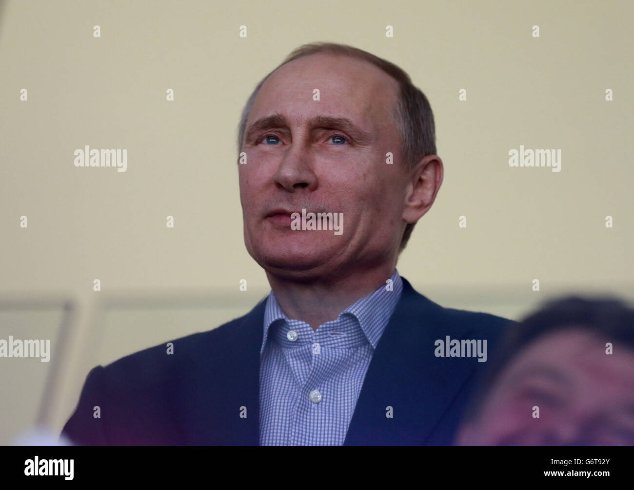 Russian President Vladimir Putin watches USA play Russia during their Preliminary round match at the Bolshoy Ice Dome, during the 2014 Sochi Olympic Games in Sochi, Russia. Stock Photo