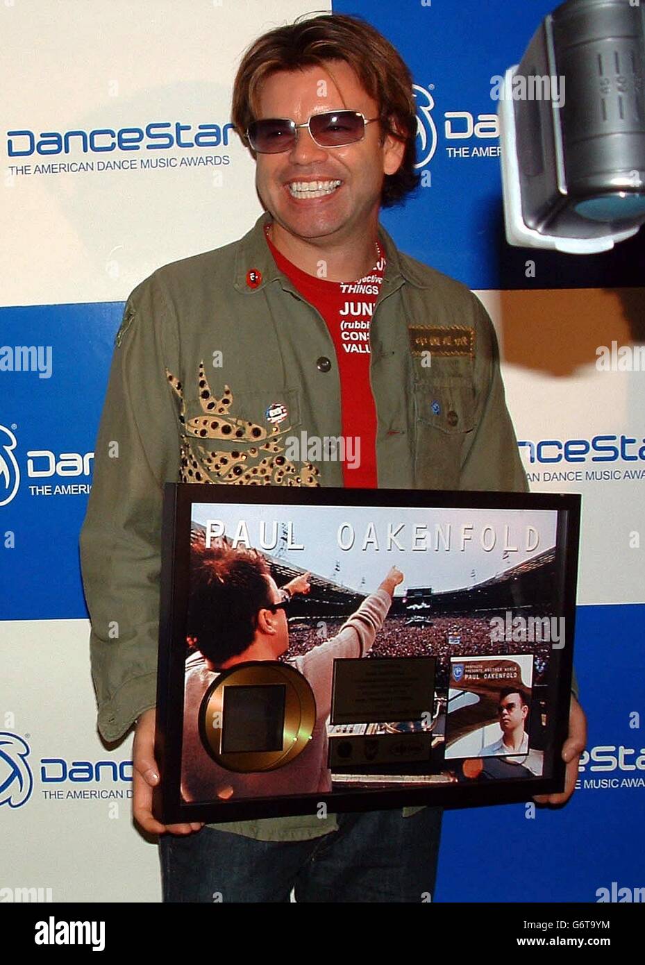 British DJ Paul Oakenfold with his special award for his album going