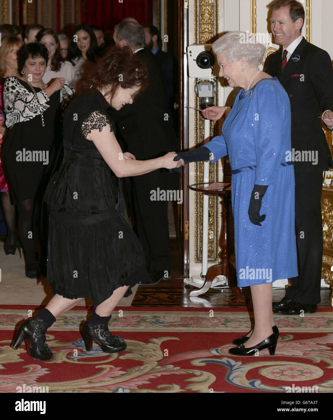 Queen Elizabeth II meets Helena Bonham Carter during a Reception