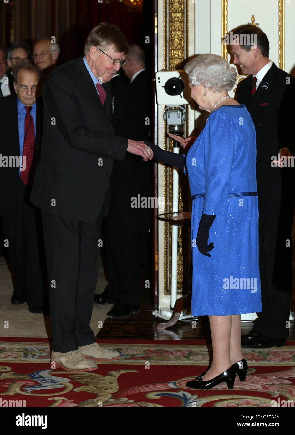 Queen Elizabeth II meets Alan Bennett during a Reception for the Dramatic Arts, at Buckingham Palace, London. Stock Photo