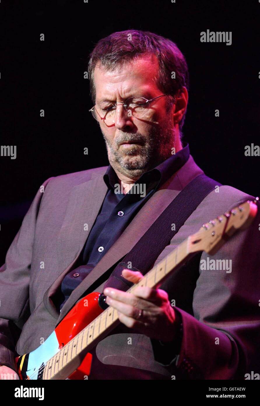 music celebrity performing on stage guitarist legend eric