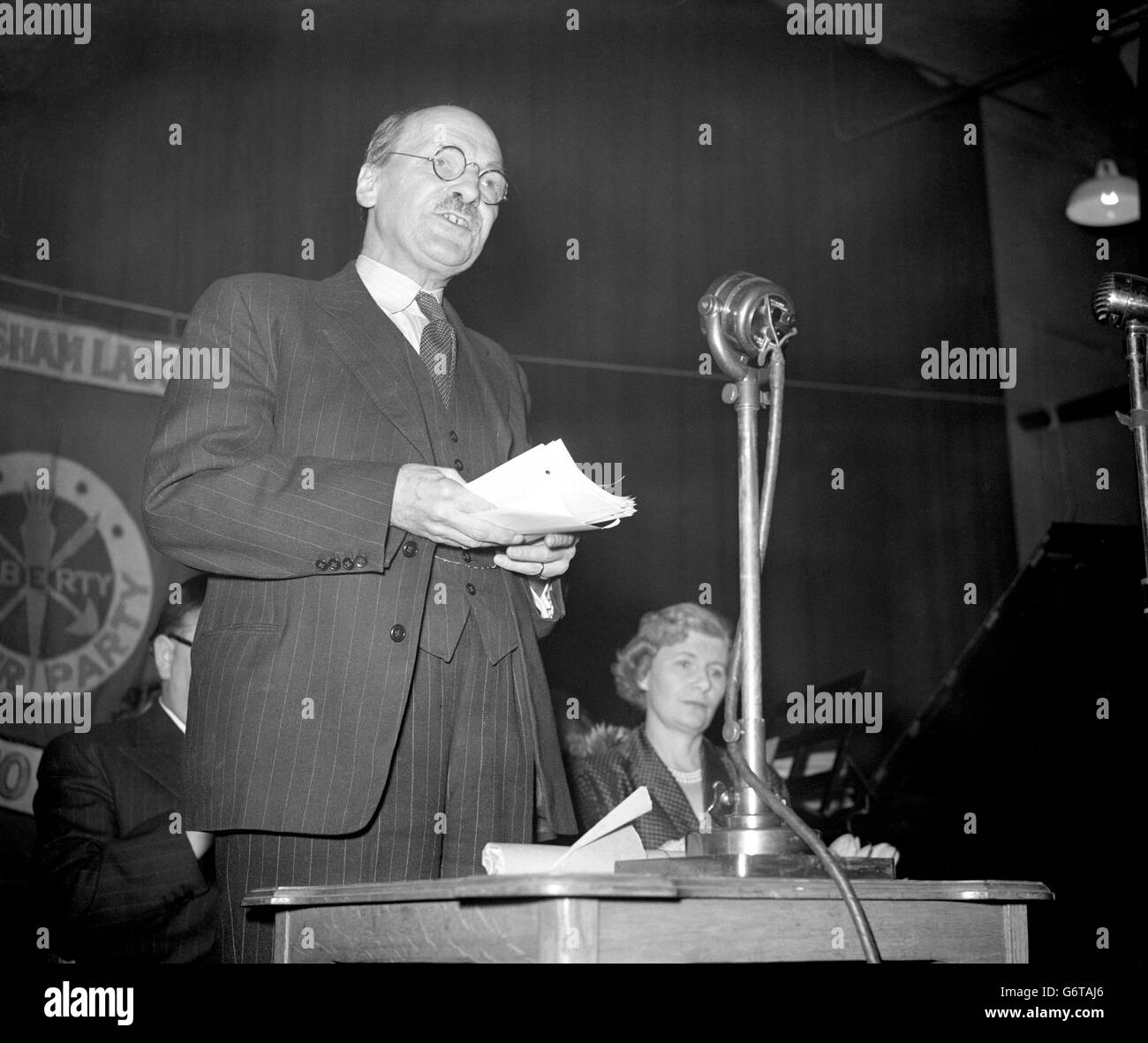 Prime Minister Clement Attlee addresses the West Lewisham Labour Party meeting in Forest Hill, London. He argued that Soviet Russian imperialism made the re-arming of Britain necessary. Stock Photo