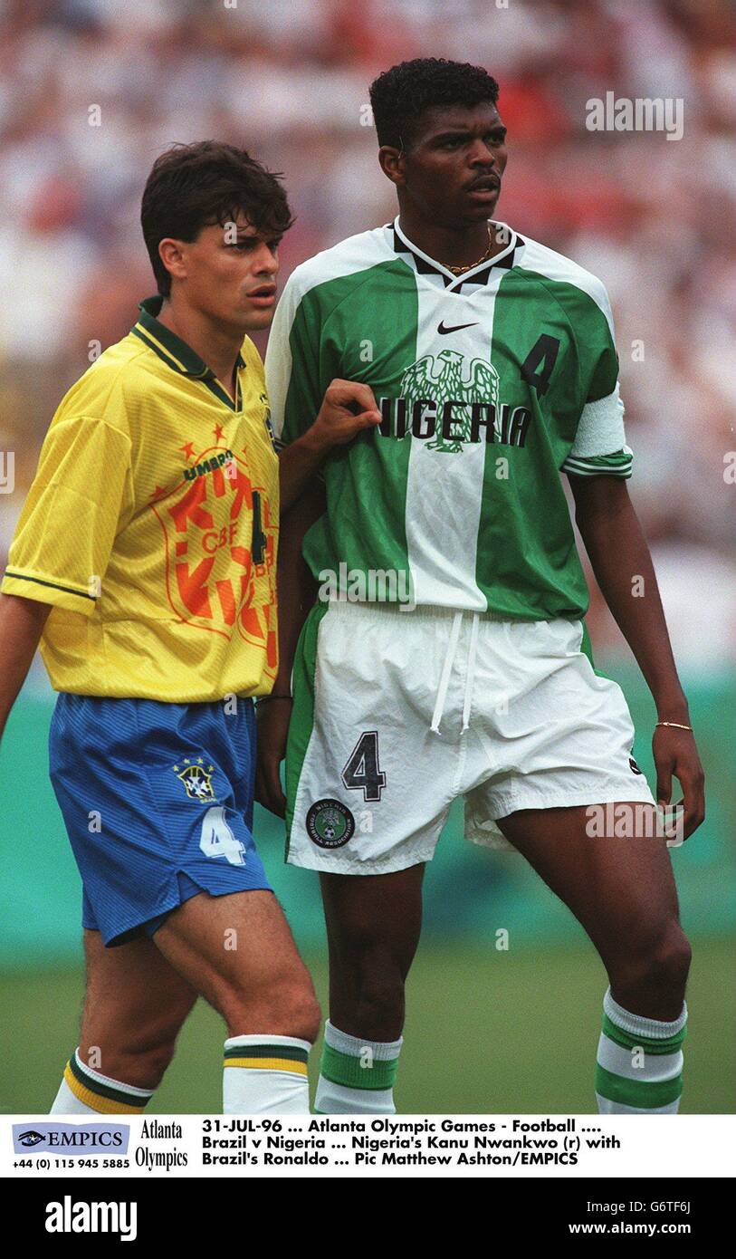 Atlanta Olympic Games - Soccer. Brazil v Nigeria. Nigeria's Nwankwo Kanu (r) with Brazil's Ronaldo Stock Photo