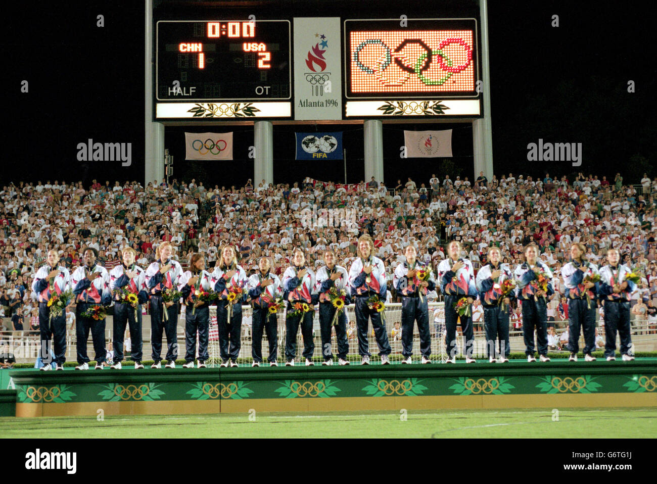 1-AUG -1996. Atlanta Olympic Games. Women's Soccer. China v USA. Joy Fawcett and Carin Gabarra, USA, celebrate their team's Gold Medal win Stock Photo