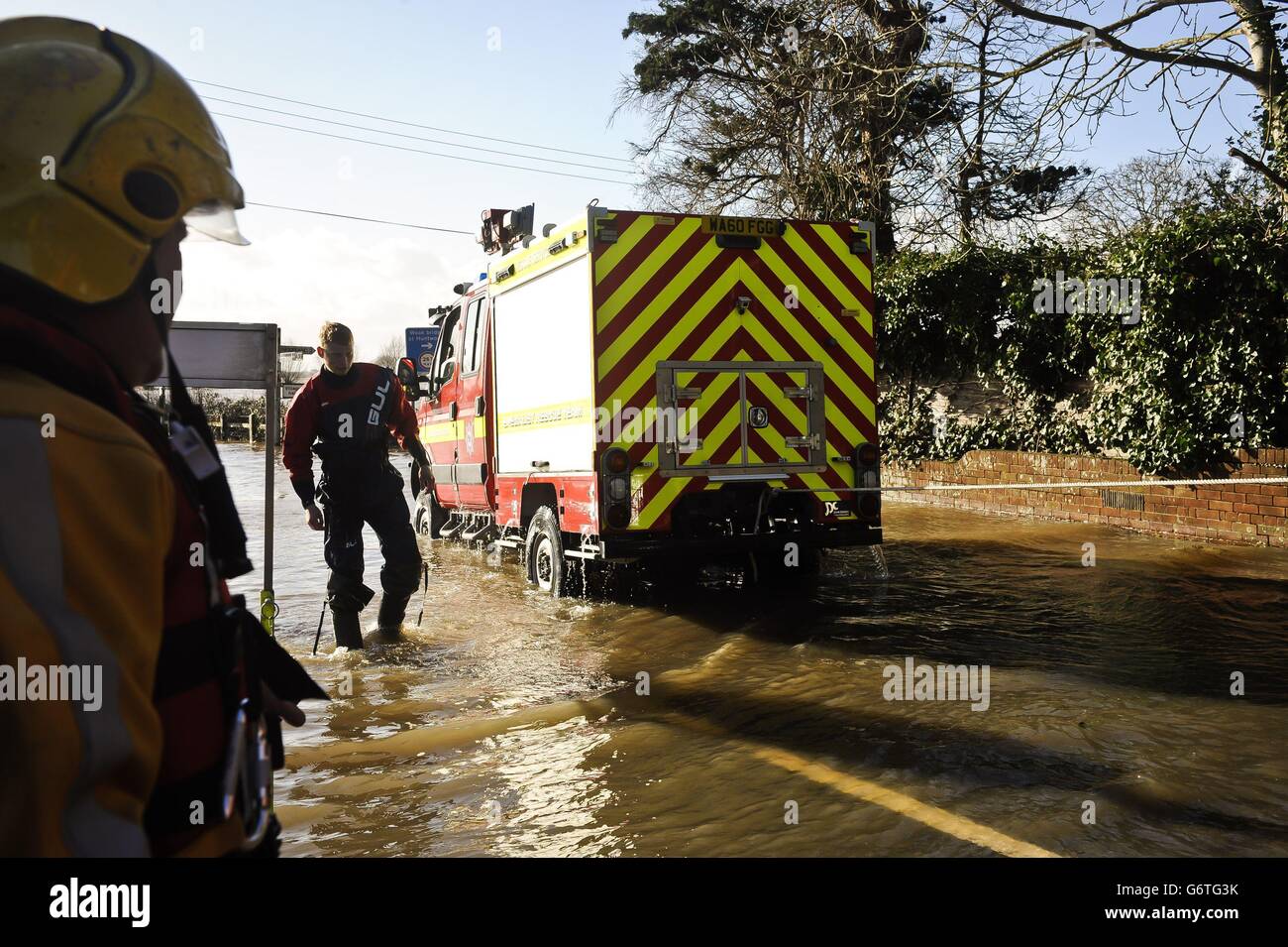 A Devon and Somerset Fire and Rescue service special vehicle gets stuck while driving through flooding in Burrowbridge, Somerset. Stock Photo