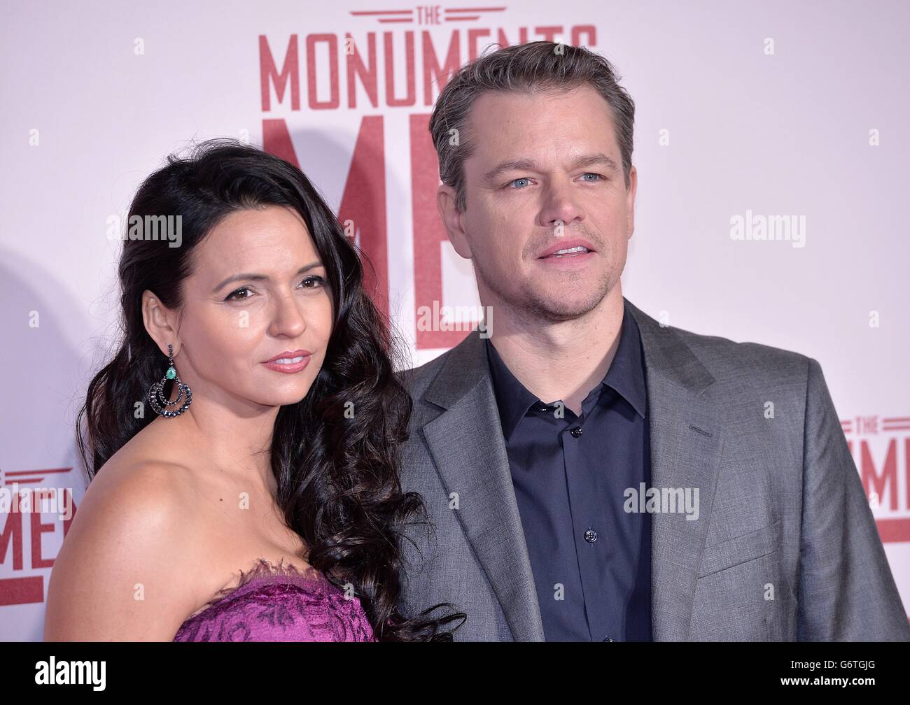 Matt Damon and wife Luciana Barroso arriving for the UK Premiere of The Monuments Men, at the Odeon Leicester Square, London. Stock Photo