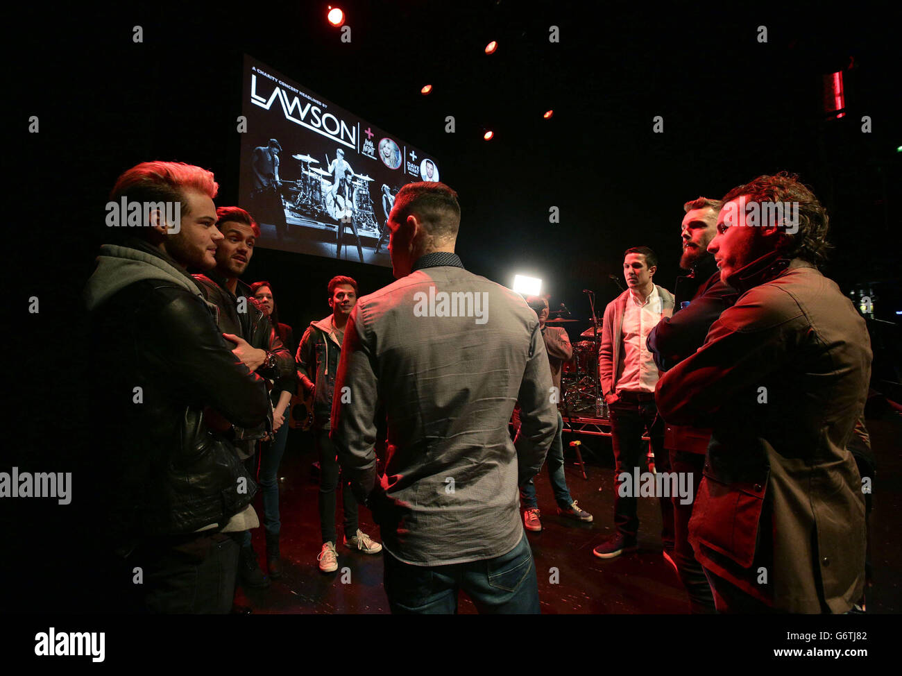 Charlton Athletic players meeting pop group Lawson during the Charlton Athletic Community Trust Concert - in partnership with Help a Capital Child - at The IndigO2, O2 Arena in London. Stock Photo