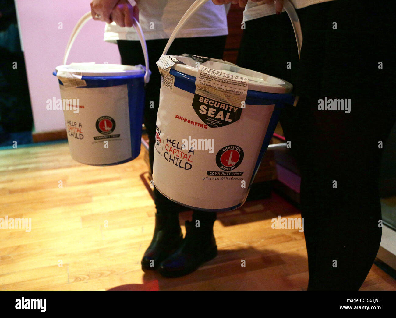 Charity fundraising buckets at the Charlton Athletic Community Trust