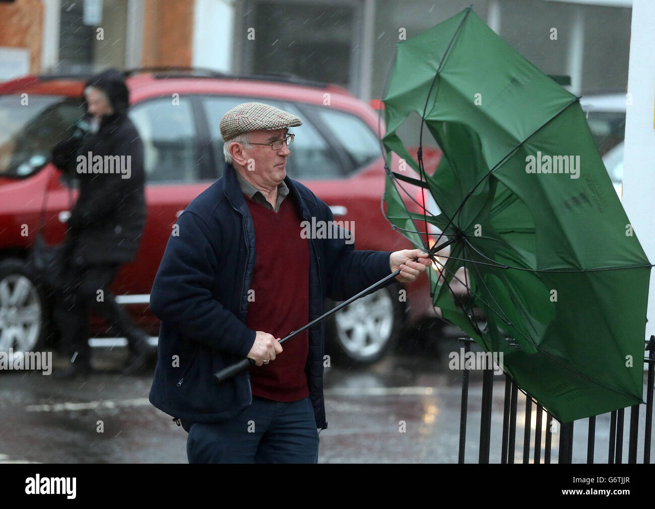Man struggles with an umbrella hires stock photography and images Alamy