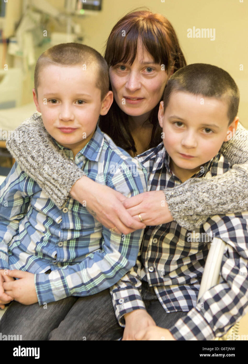 Zoe Louise McConville with her sons Kyle Roper, aged 7, (left) and