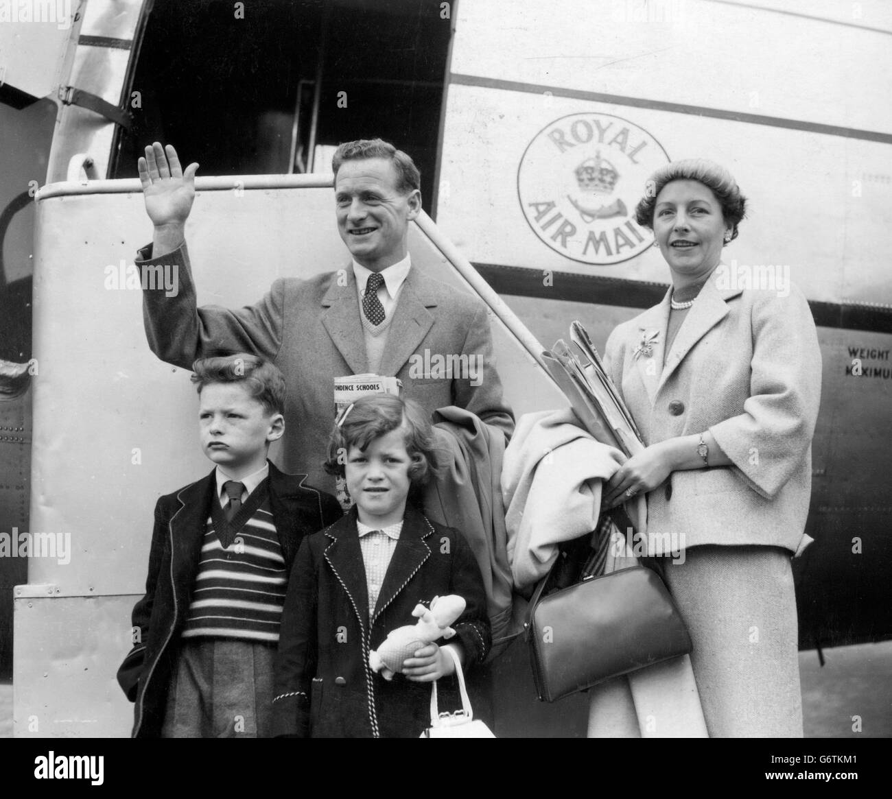 Preston and England footballer Tom Finney with his wife and children Brian, 7, and Barbara, 5. They were flying to Northern Rhodesia, where Finney is due to embark on a 6-week coaching tour. Stock Photo