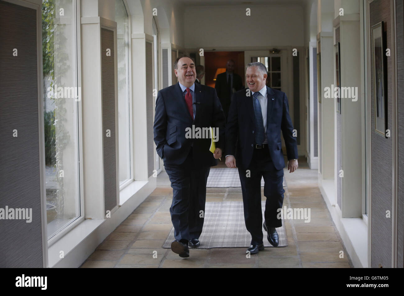 Scotland's First Minister Alex Salmond (left) and Chairman Business for Scotland Tony Bank arrive for the Business for Scotland event in Aberdeen, where Salmon talked about key plans for independence after a weekend of pressure on whether the country could keep sterling as currency or expect a smooth transition to EU statehood. Stock Photo