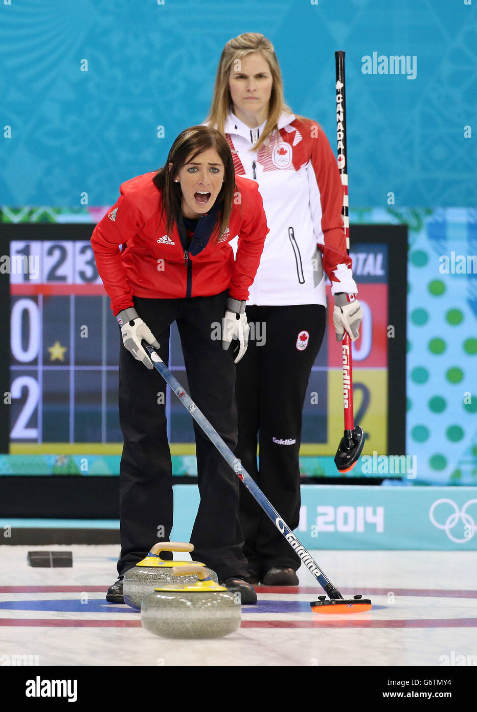 Great Britain's Eve Muirhead with Canada's Jennifer Jones during their