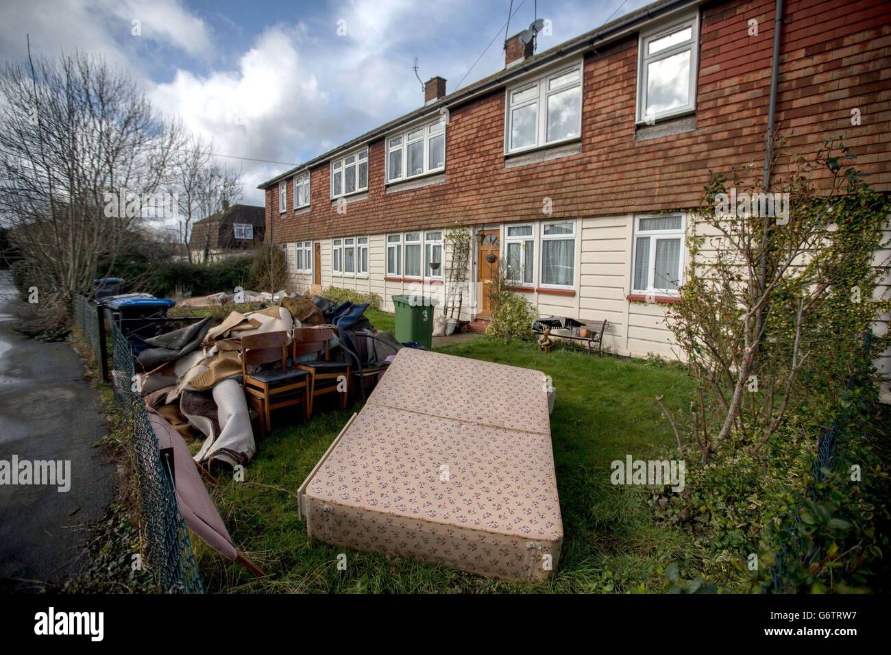Flood damaged furniture outside homes in StainesuponThames, Surrey
