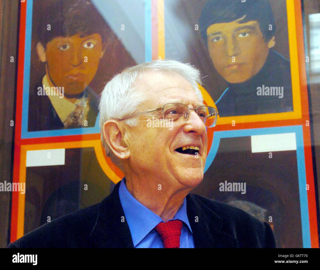 Professor Sir Colin St John Wilson, architect of the British Library, stands in front of Peter Blake's 'The 1962 Beatles' as he discusses a few of the 600 art works from his own personal collection that he is giving through the National Art Collections Fund to Pallant House Gallery in Chichester, at a press launch in west London. The collection assembled consists of leading modern and contemporary artists working in the UK over the last century including Lucian Freud, Frank Auerbach, Peter Blake and Patrick Caulfield. Stock Photo