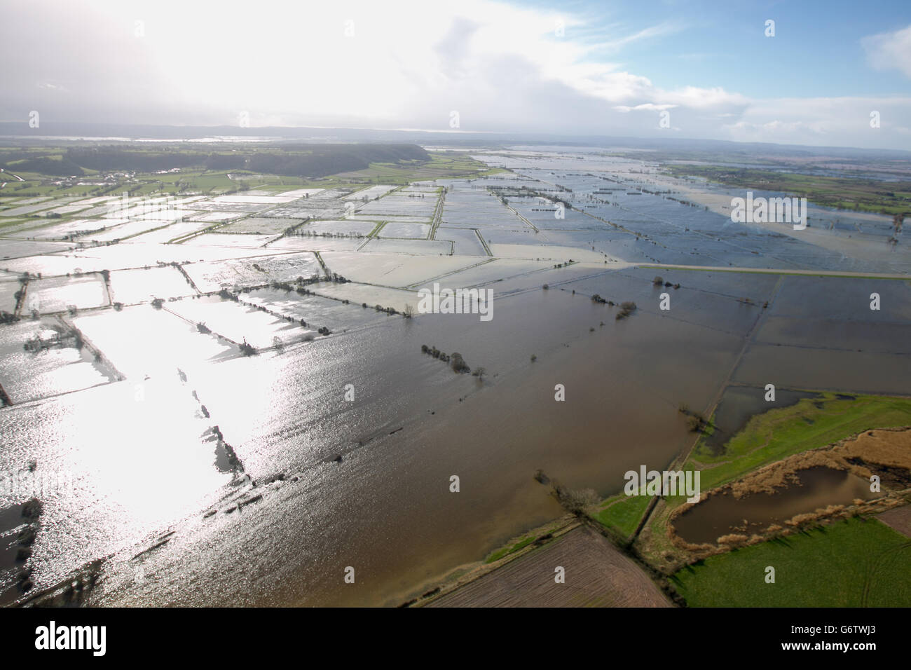 Water surrounds flooded properties on somerset levels near bridgwater