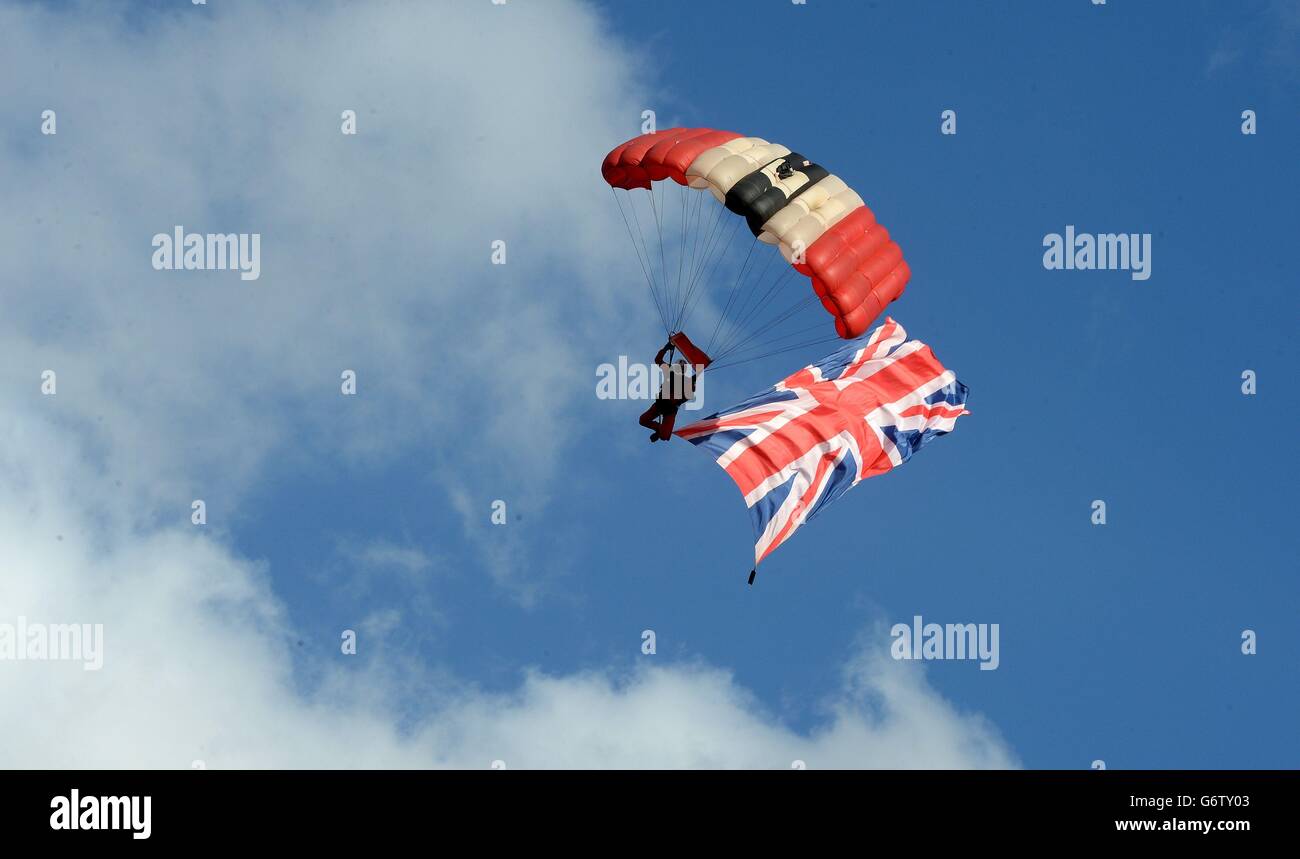 Corporal Mike French of the RAF Red Devils parachute display team, prepares to land at the AJ Bell Stadium, before the Super League match at the AJ Bell Stadium, Salford. Stock Photo