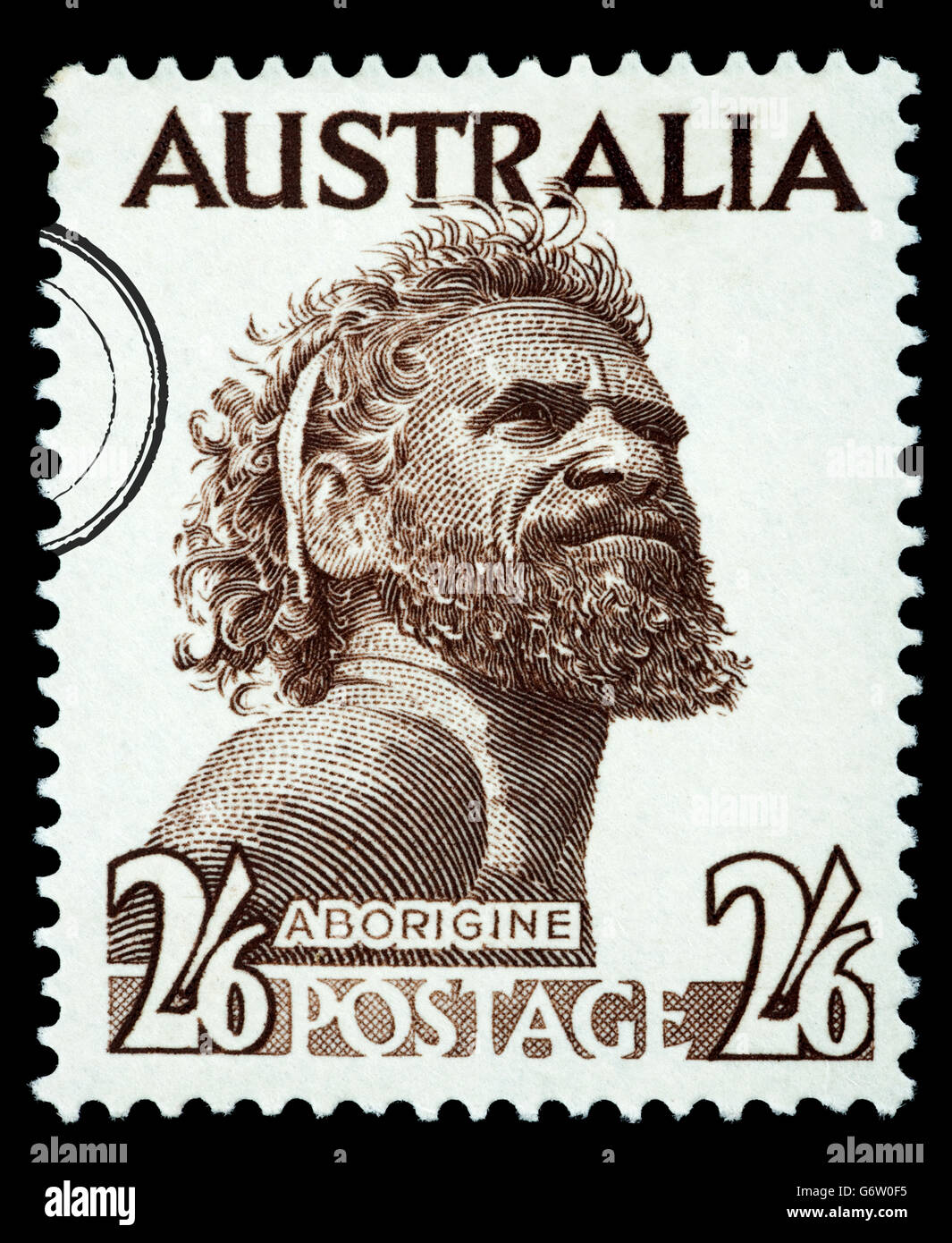 A postage stamp printed in the Australia showing an Aborigine Man Stock Photo