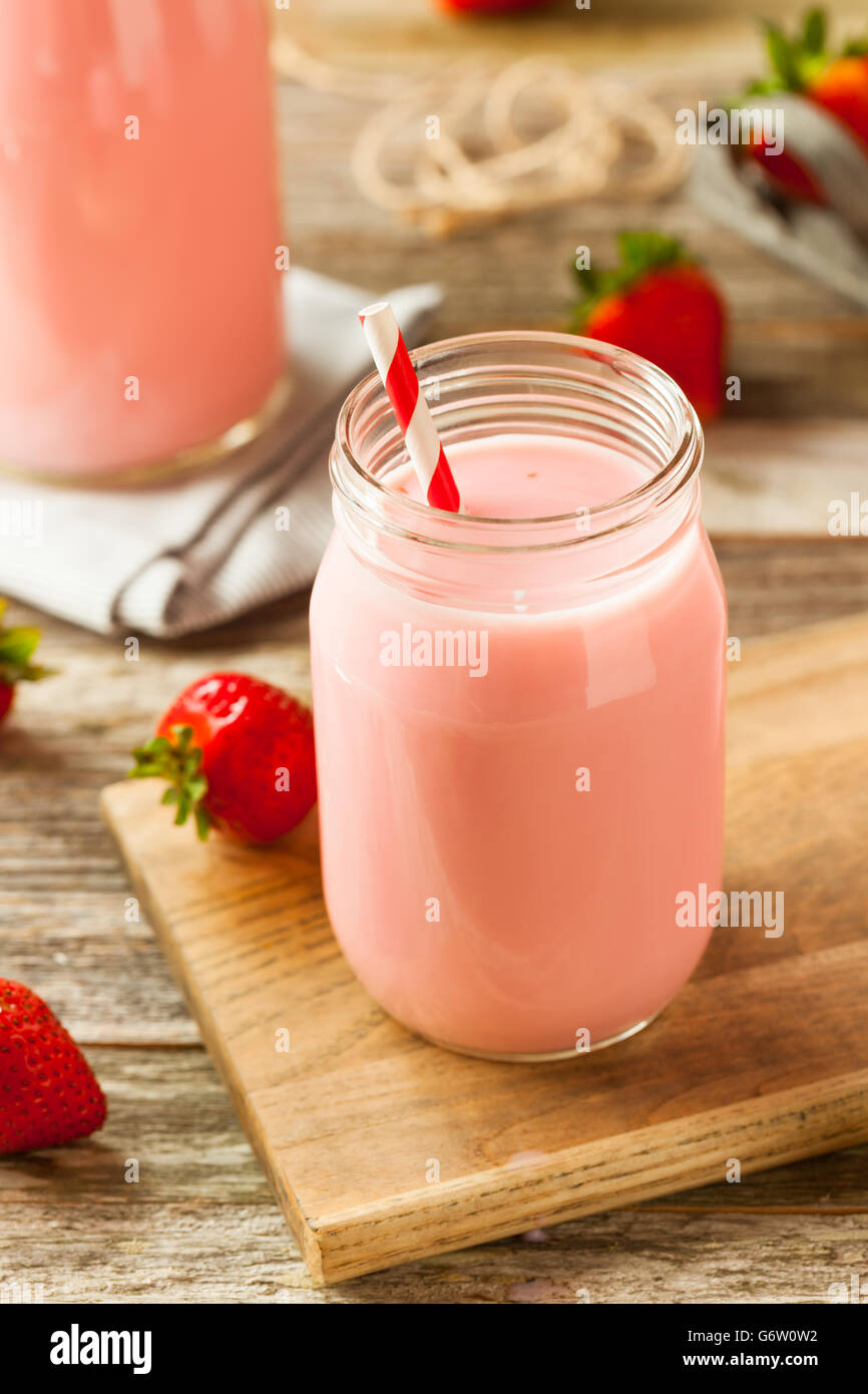 Homemade Organic Strawberry Milk Ready to Drink Stock Photo