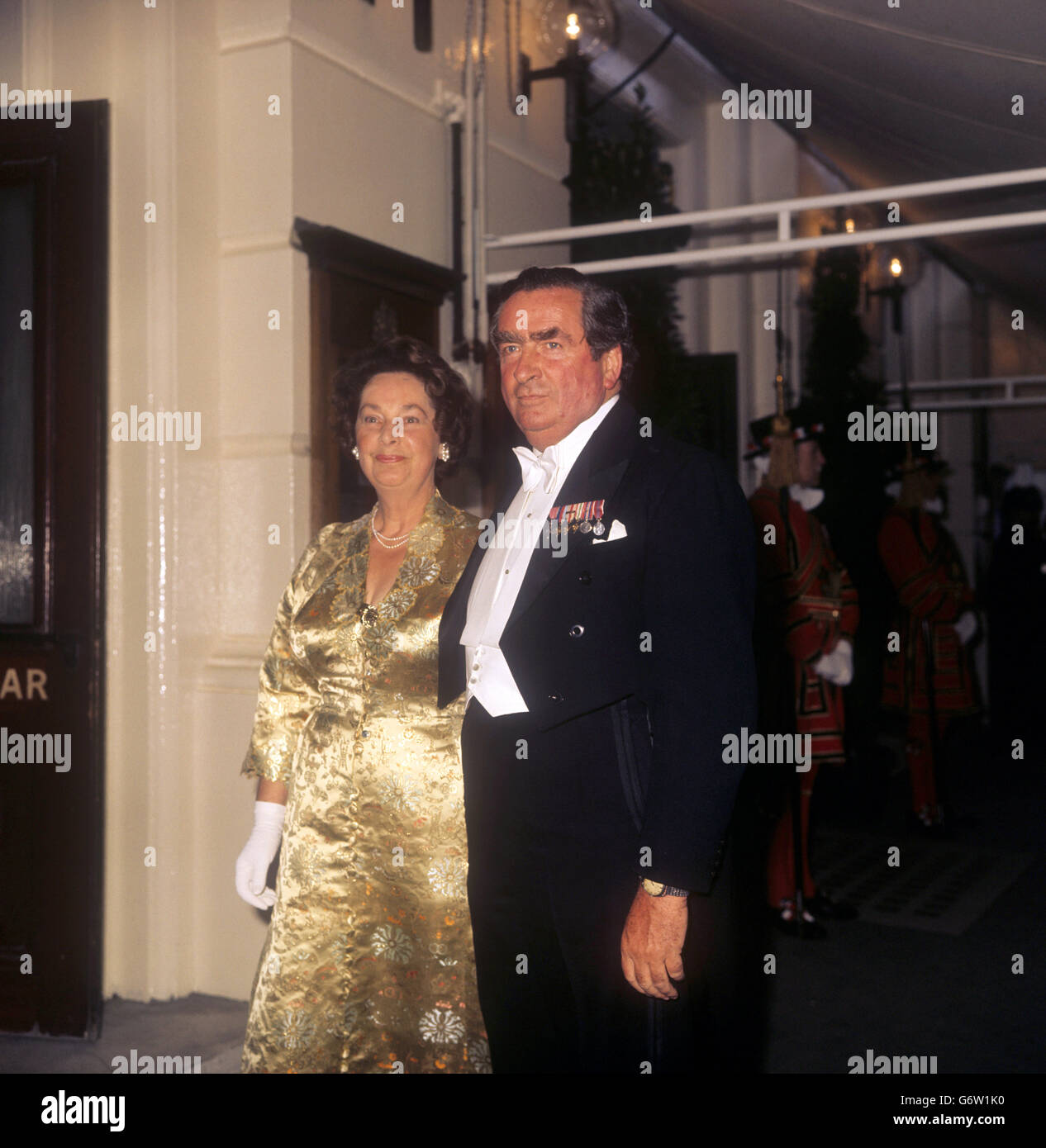 Chancellor of the Exchequer, Denis Healey, with his wife Edna on arrival at the Royal Opera House, Covent Garden, when they attended the Gala Silver Jubilee performance of opera and ballet. Stock Photo