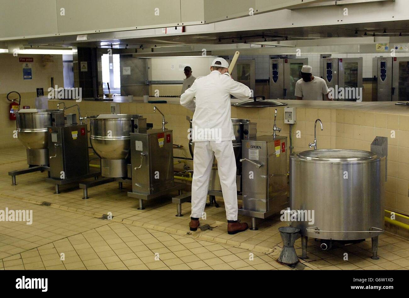 The kitchens at Wakefield Prison, West Yorkshire. Prison staff at Wakefield, which holds 570 inmates, 70% of whom are serving life and 20% serving 10 years or more, were criticised for their 'disrespectful' attitude to offenders in their care. Chief Inspector of Prisons Anne Owers found there was an 'extremely high' number of complaints from inmates about bullying, although they added that procedures to deal with the complaints were thorough. Stock Photo
