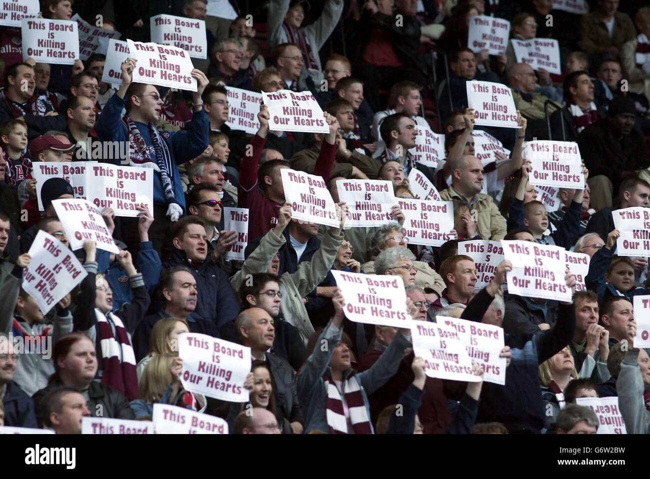 Hearts fans protest against their board during the Bank of Scotland Premier League match at Tynecastle Park, Edinburgh, Saturday March 27, 2004. EDITORIAL USE ONLY Stock Photo