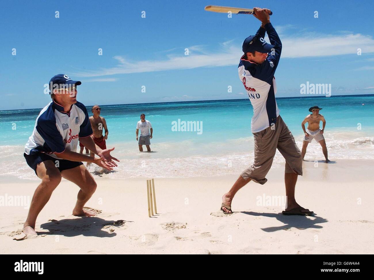 England captain Michael Vaughan and Matthew Hoggard (left) play beach cricket with supporters near the team hotel, Worthing, Barbados. England yesterday won the third Test against West Indies in three days to take a 3-0 lead in the four match series. Stock Photo