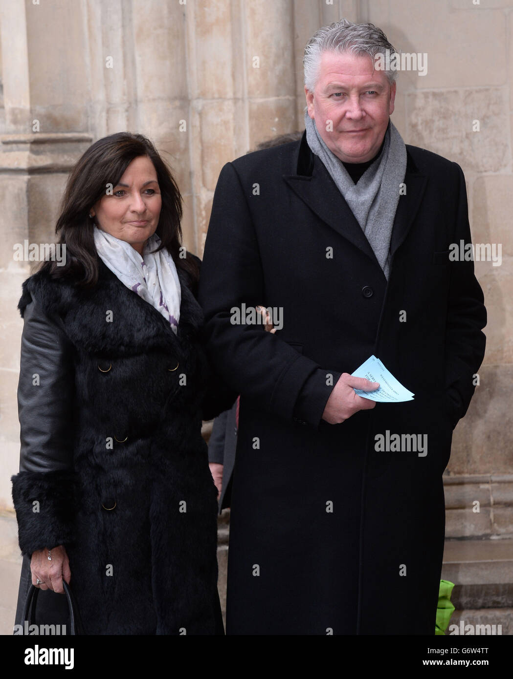 Tommy Walsh arrives with his wife Marie, at Westminster Abbey in London for a memorial service for the former South Africa president Nelson Mandela. Stock Photo