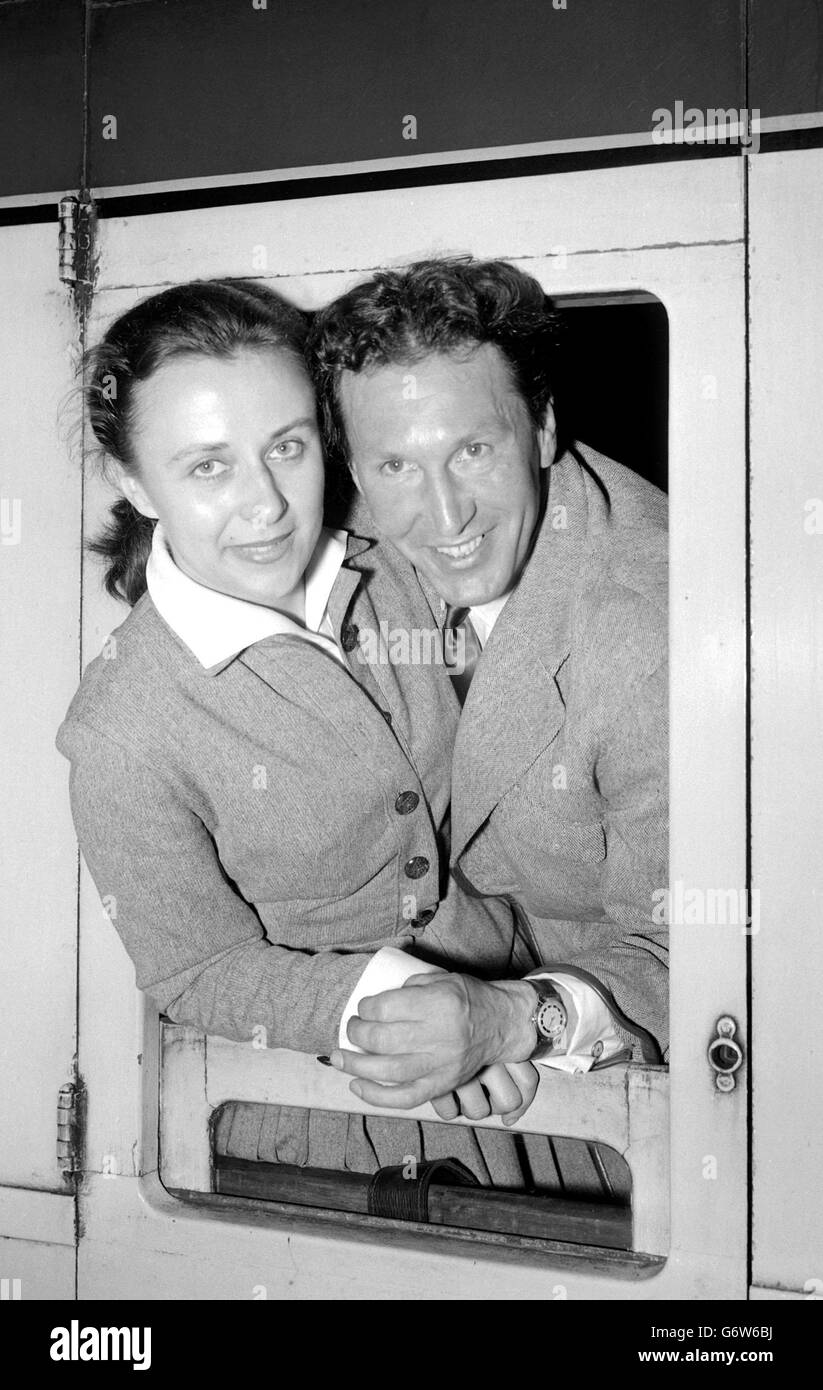 Franz Stampfl, the man who has coached many of Britain's star athletes, leaving St Pancras Station, London, on his way to Australia. With his wife, Patsy, who is Australian, he is going to Melbourne to coach at the University there and to organise a coaching scheme for the State of Victoria. Stock Photo